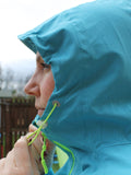Detail of Gaia Waterproof Jacket ponytail-friendly hood with adjustable toggles and reinforced peak
